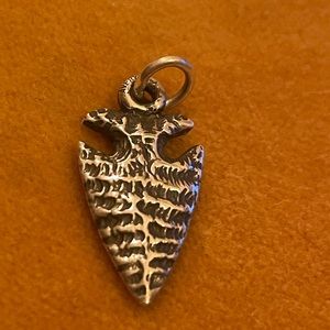 Retired arrowhead charm